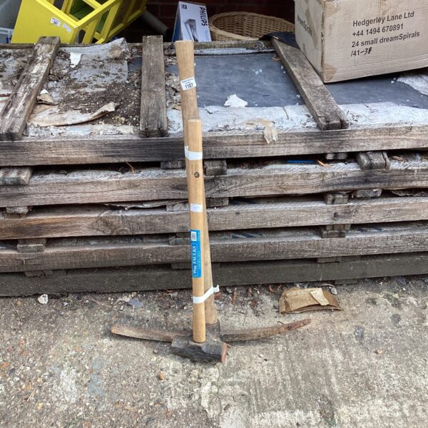 Large pick and sledgehammer set for demolition and garden work.