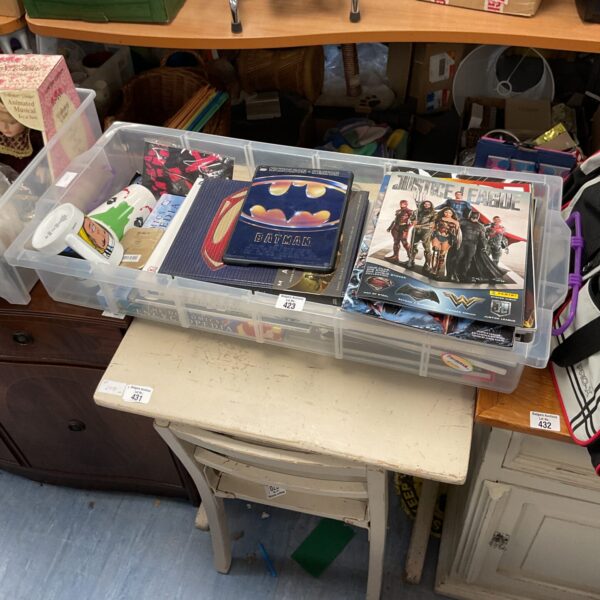 DC Comics collectibles lot including books and stickers.