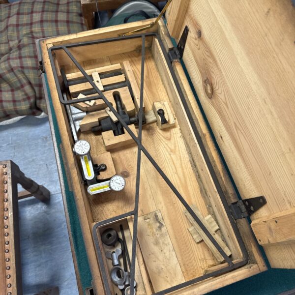 Vintage Dunlop wheel alignment gauge in wooden case.