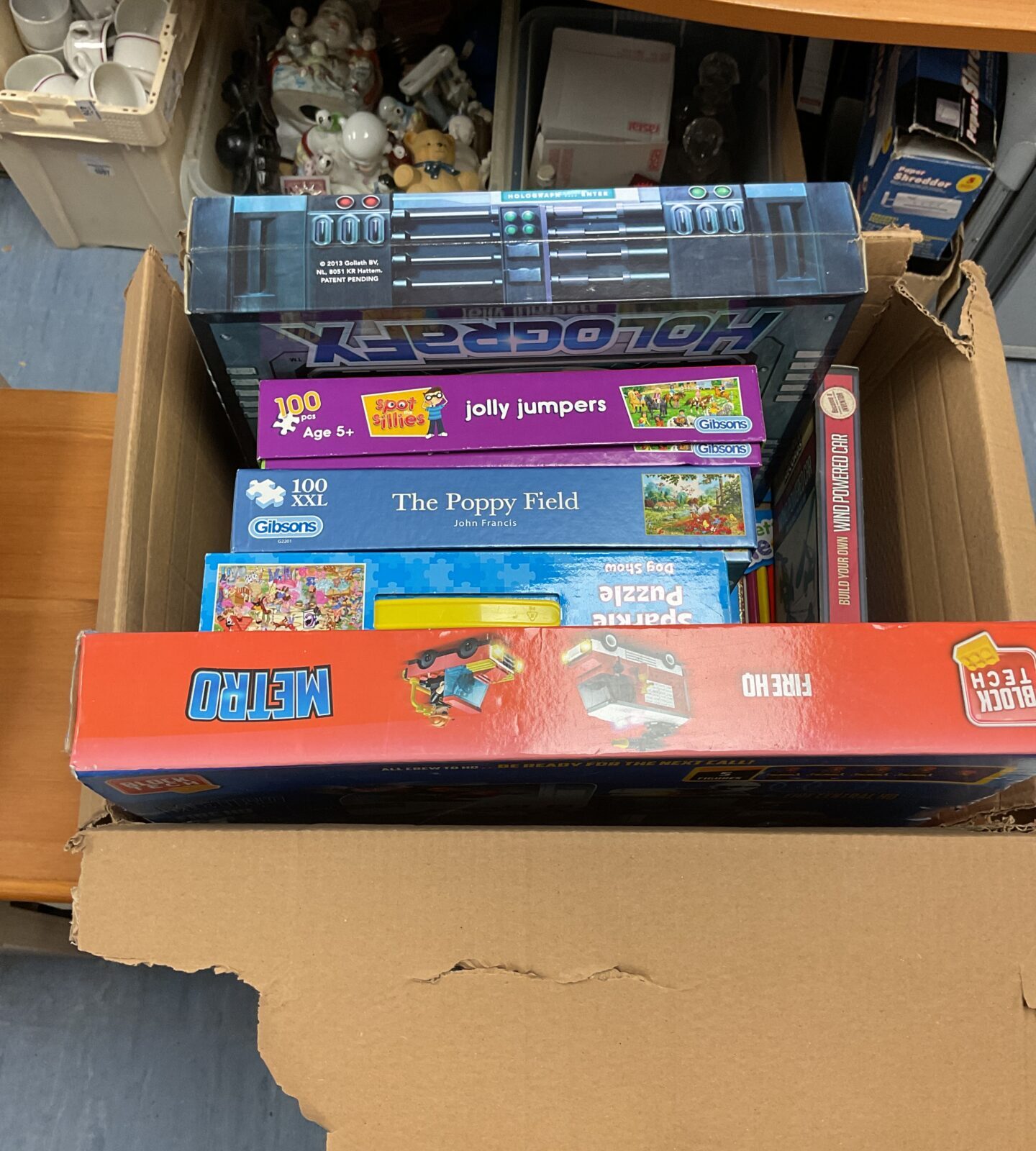 Box of mixed toys inc gibsons and holografx