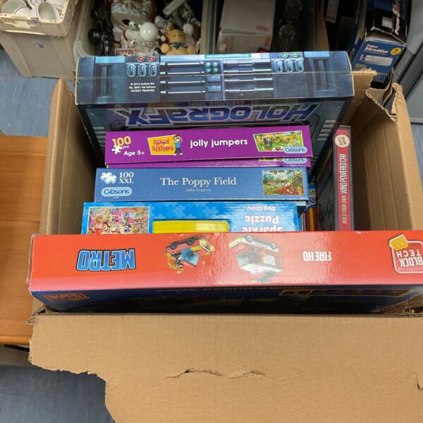 Box of mixed toys inc gibsons and holografx