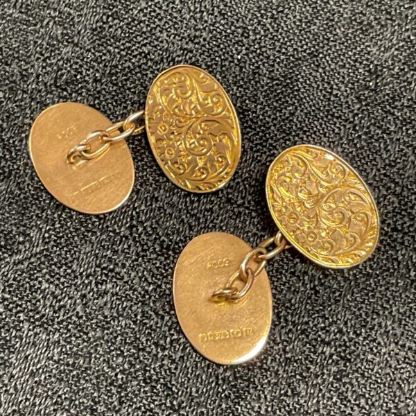 Hallmarked 9ct gold cufflinks, a classic men's jewellery accessory.