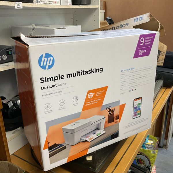 HP Deskjet 4130e printer in box, vintage home office equipment.