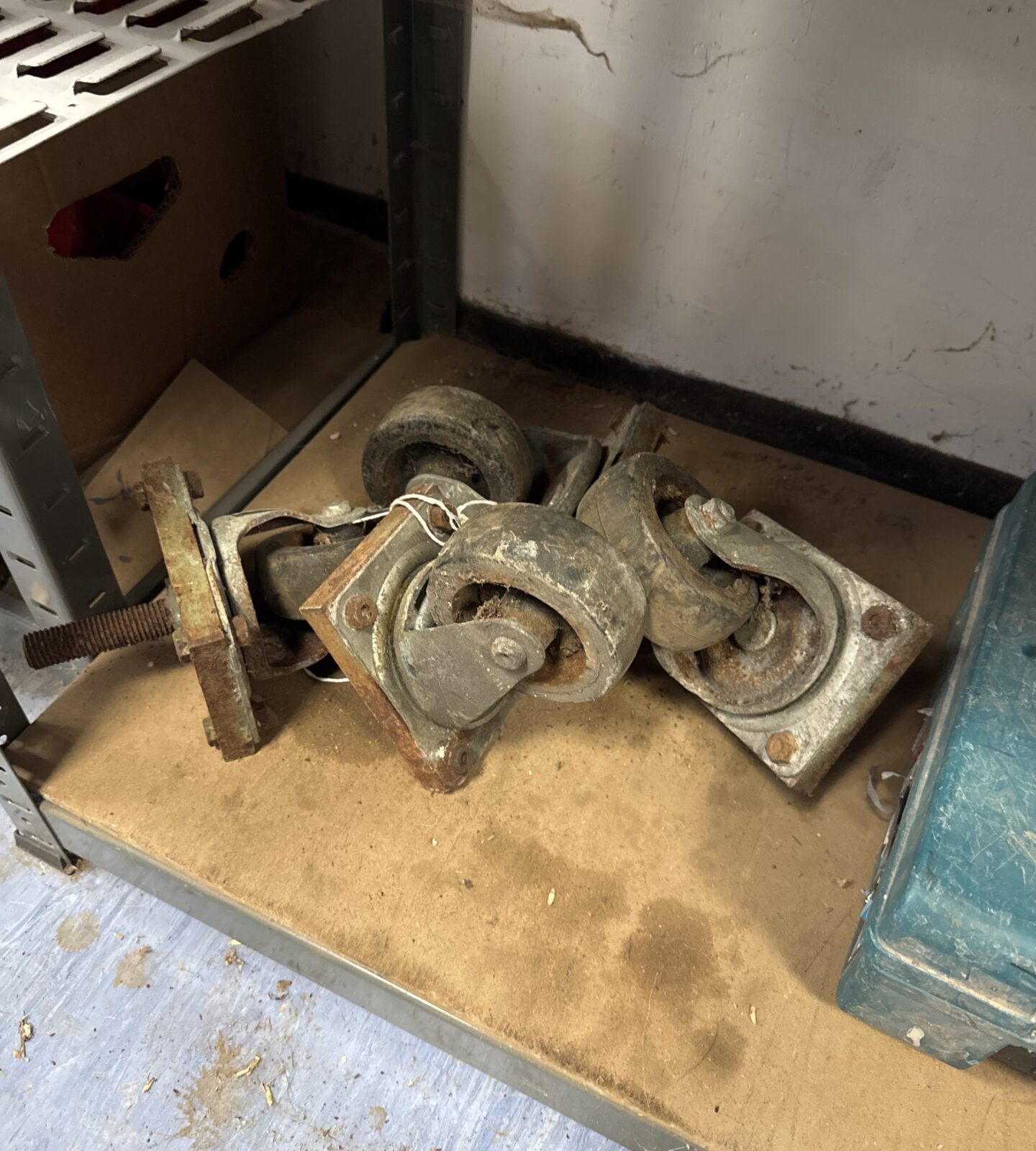 Four vintage heavy duty castor wheels