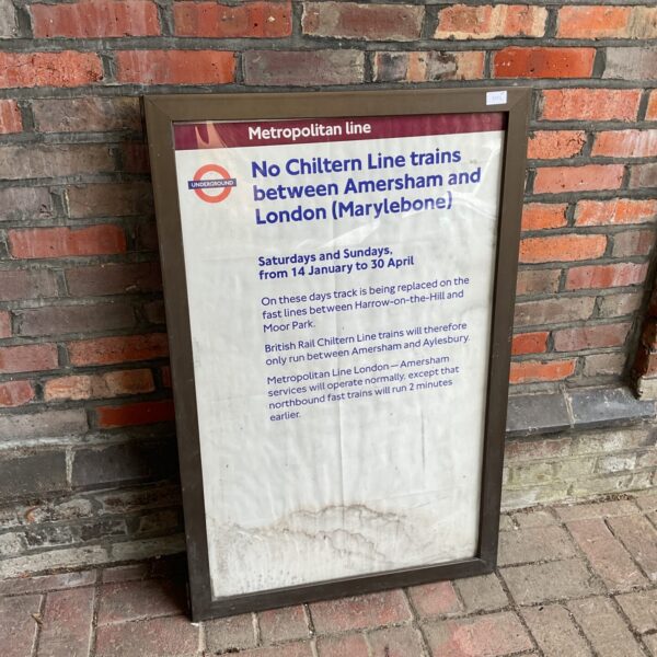Framed vintage Metropolitan Line poster detailing service alterations.