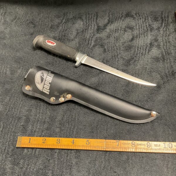 Vintage Rapala Norwegian fish knife with leather sheath for filleting fish.