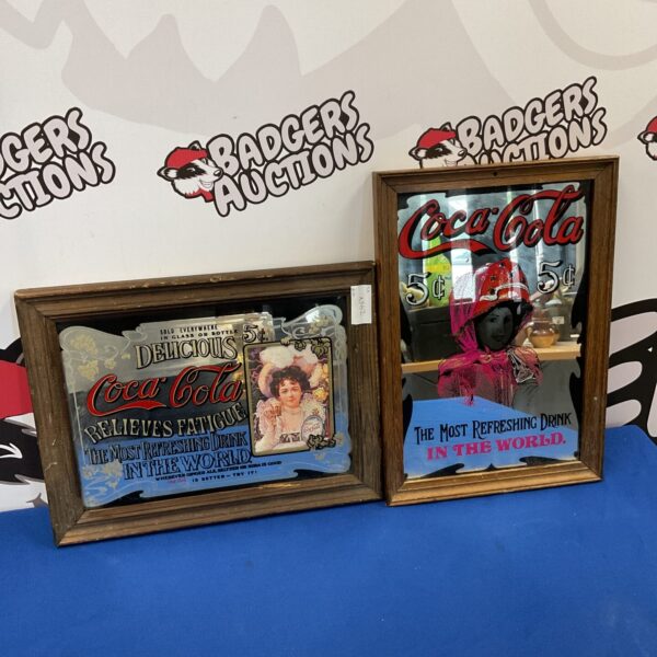 Vintage Coca-Cola mirror pair for retro pub decor.