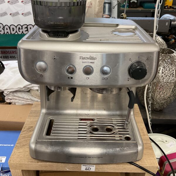 Stainless steel Breville Barista Max coffee machine for home brewing.