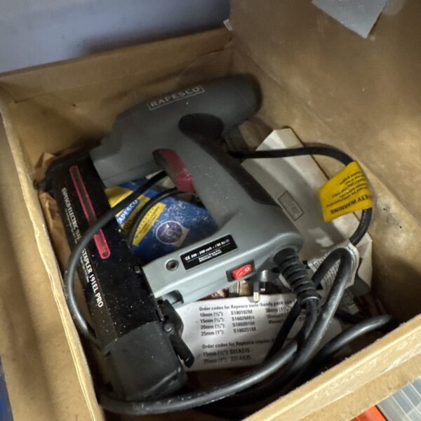 Rapesco electric staple gun side view, vintage power tool.