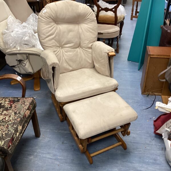 Rocking chair with rocking footrest