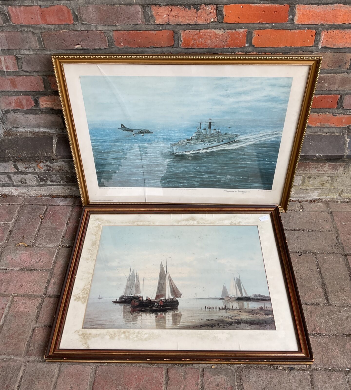 Two large gilt framed nautical prints including signed hms invincible by roderick lovesey