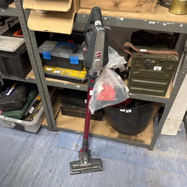 Hoover H-Free 300 cordless vacuum cleaner with charger and accessories.
