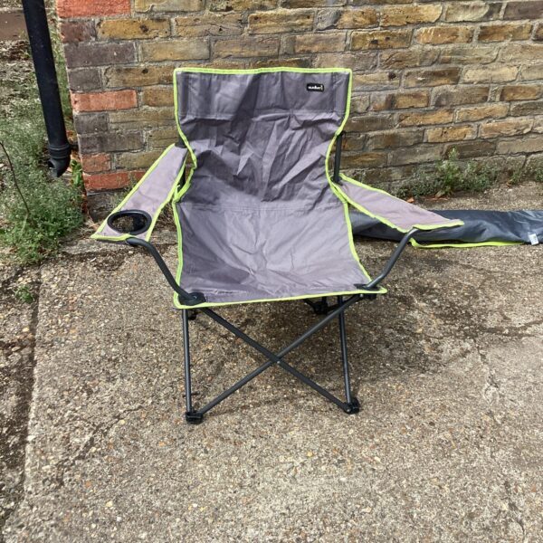 Grey Summit folding camping chair with cup holder.