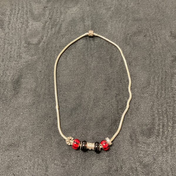 Silver and glass Murano charm necklace, colourful fashion jewellery.