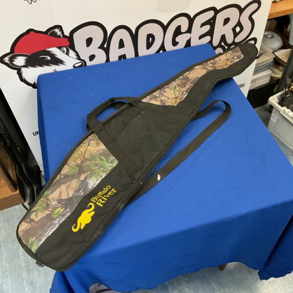 Camouflaged Buffalo River rifle case for secure firearm transport.