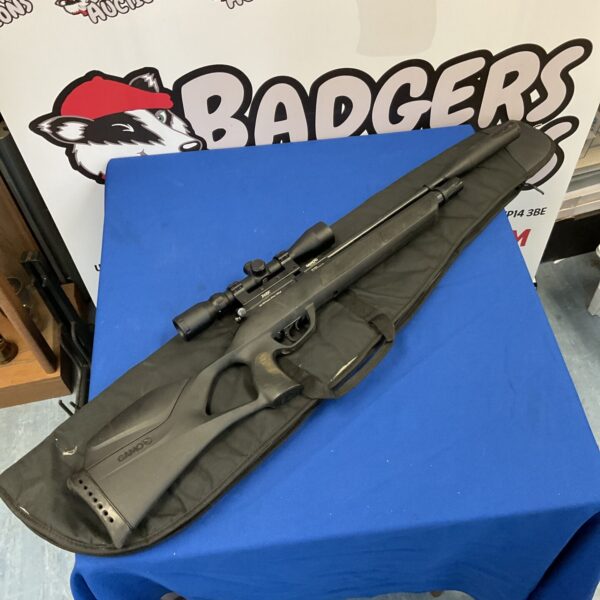 Gamo Phox air rifle with scope and case for shooting sports.