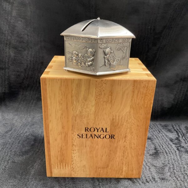 Royal Selangor pewter money box with a charming design.