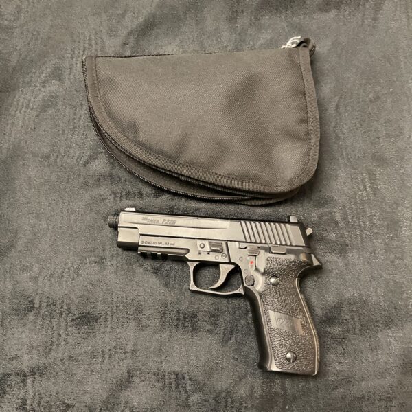 Sig Sauer P226 pellet pistol with case, realistic airgun replica.