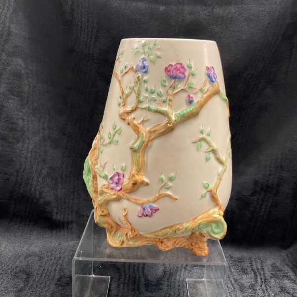 Front view of a vintage Clarice Cliff My Garden art deco vase.