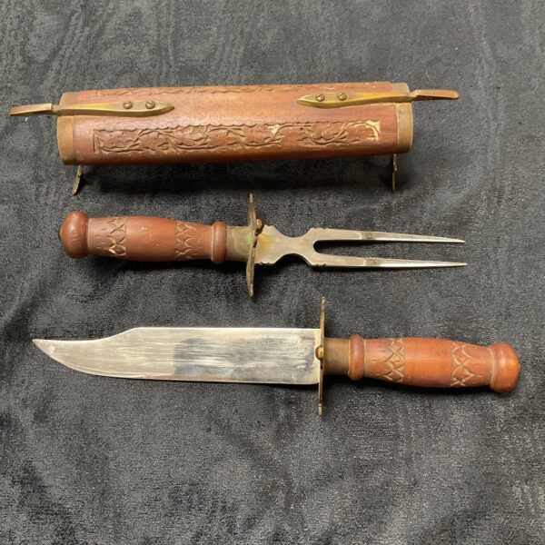 Vintage Indian carving knife set with wooden sheath and carved handles.