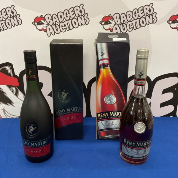 Two sealed bottles of Remy Martin VSOP Fine Champagne Cognac.