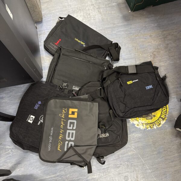 Vintage laptop bags lot featuring Lotus Software branding.