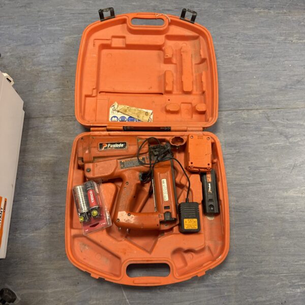 Paslode Impulse staple gun in its carrying case.