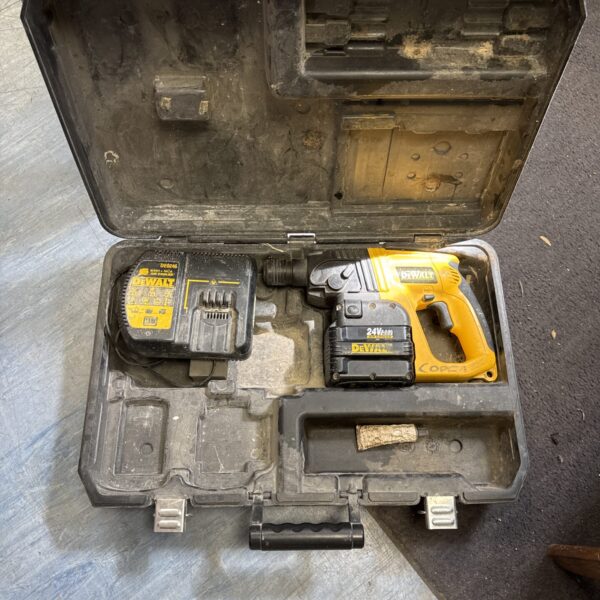 Dewalt cordless drill with battery and charger in open case.