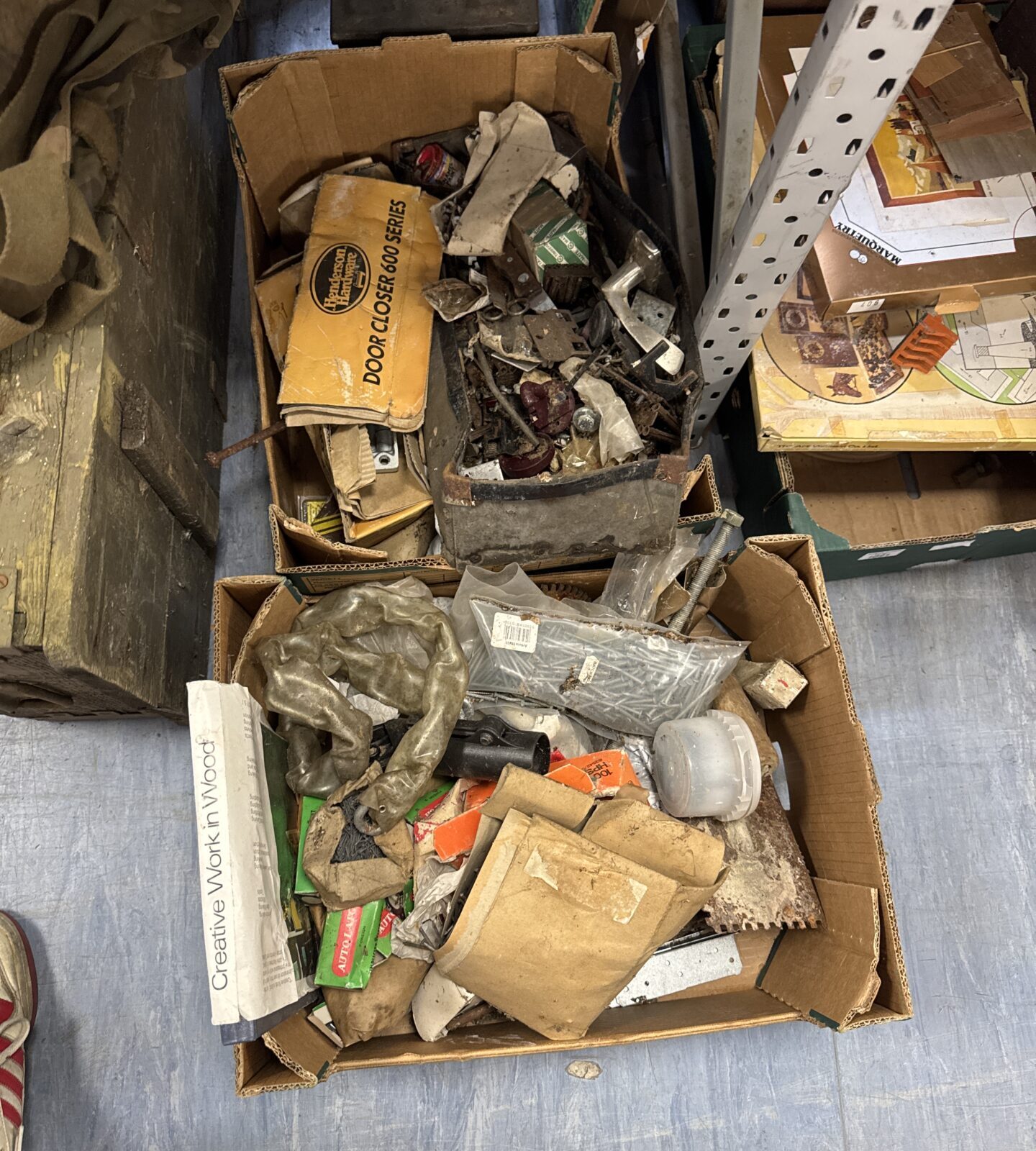 Two boxes of shed clearance items inc nails & others