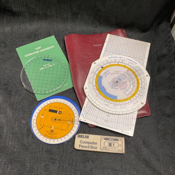 Vintage Pooley Airtour CRP-5 flight computer and pilot navigation tools.