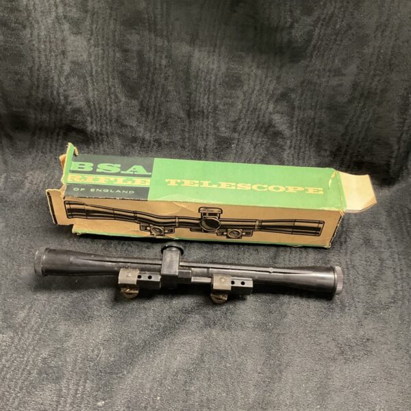 Vintage BSA rifle scope, classic hunting optics, antique condition.