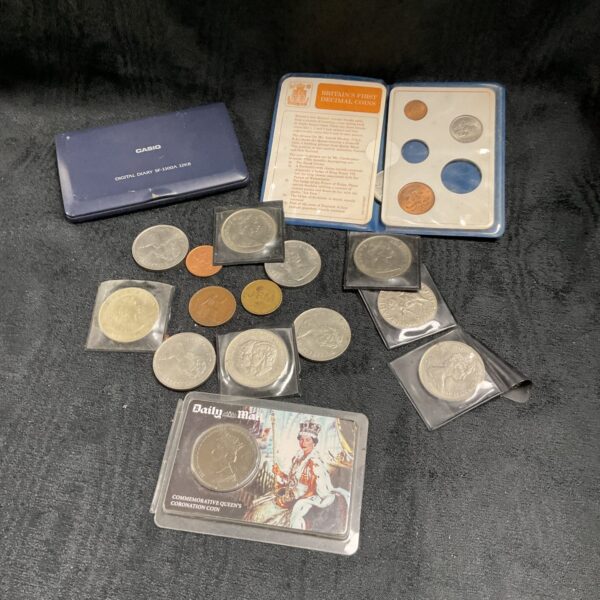 British commemorative coins and vintage Casio digital diary collection.