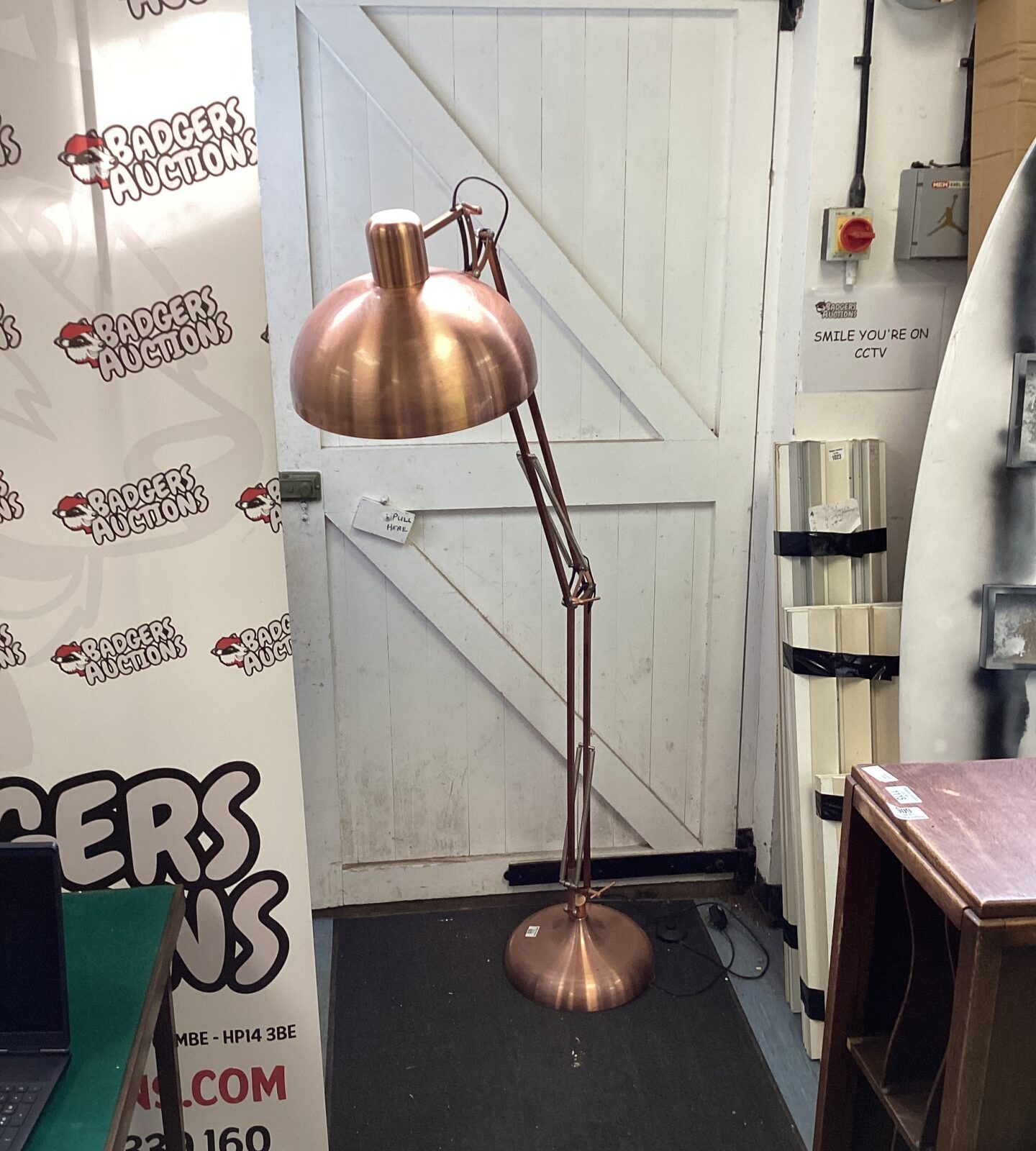 Rose gold floor standing angle poise style lamp