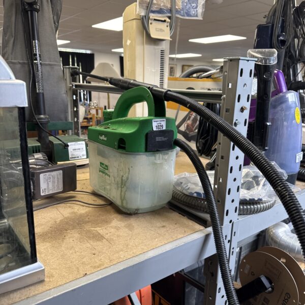 Used Cuprinol fence sprayer for garden wood treatment.