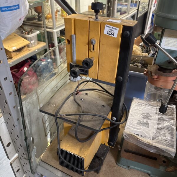 Vintage Powerline mini bandsaw for DIY projects and metal cutting.