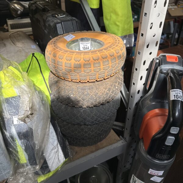 Lot of five barrow wheels for garden use.