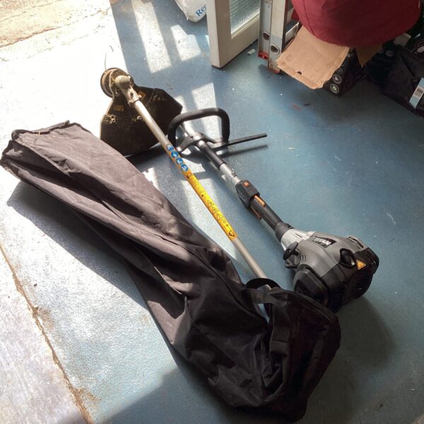 Titan 3 in 1 garden multi tool with attachments shown in image.