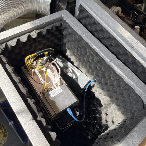 Untested Bitmain Antminer Bitcoin mining unit in foam packaging.