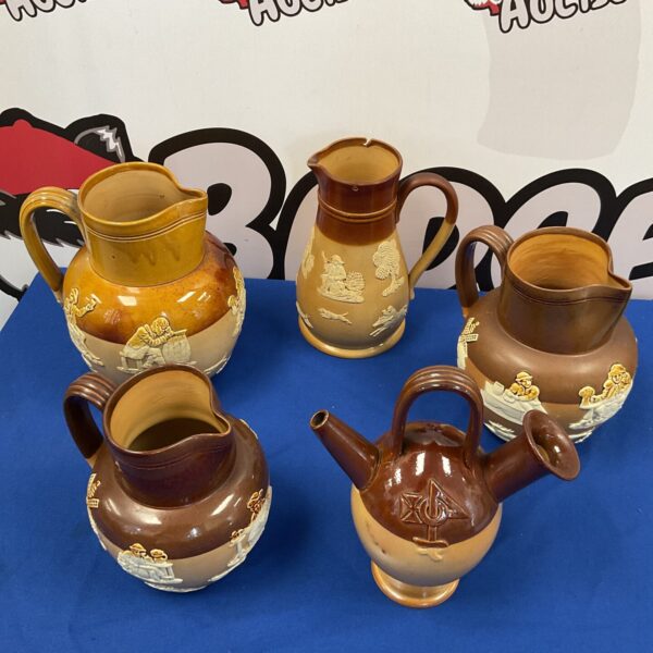 Five Victorian royal doulton Lambeth ware jugs