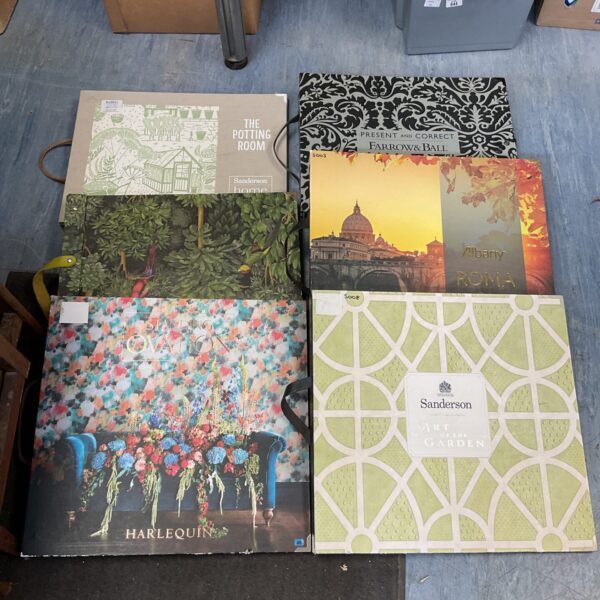 Collection of Farrow & Ball and Sanderson Home wallpaper sample books.