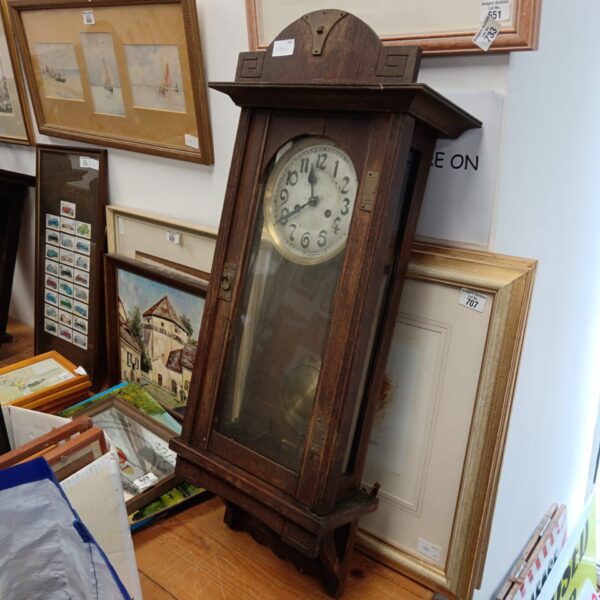 Antique oak cased wall clock with key & pendulum
