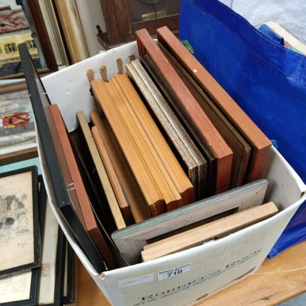 Box of empty picture frames