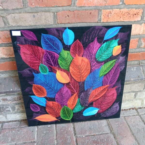 Colourful leaf print on glass panel