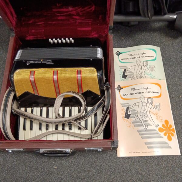 Vintage Parrott accordion in case with books