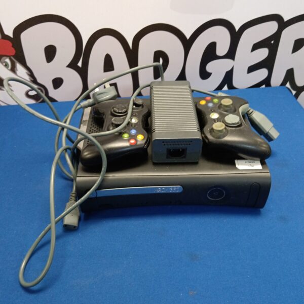 Microsoft Xbox 360 console with controllers
