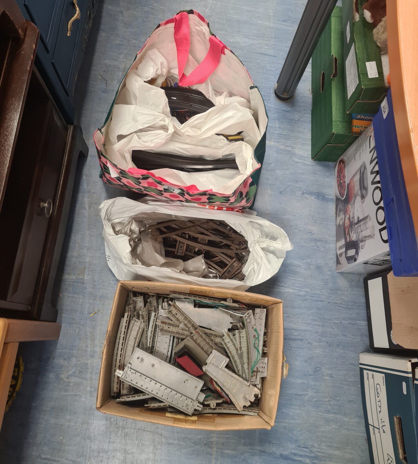 Bag of scalextric tracks with bag and box of vintage hornby tracks
