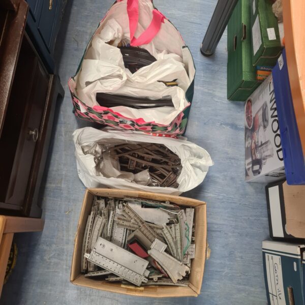 Bag of scalextric tracks with bag and box of vintage hornby tracks