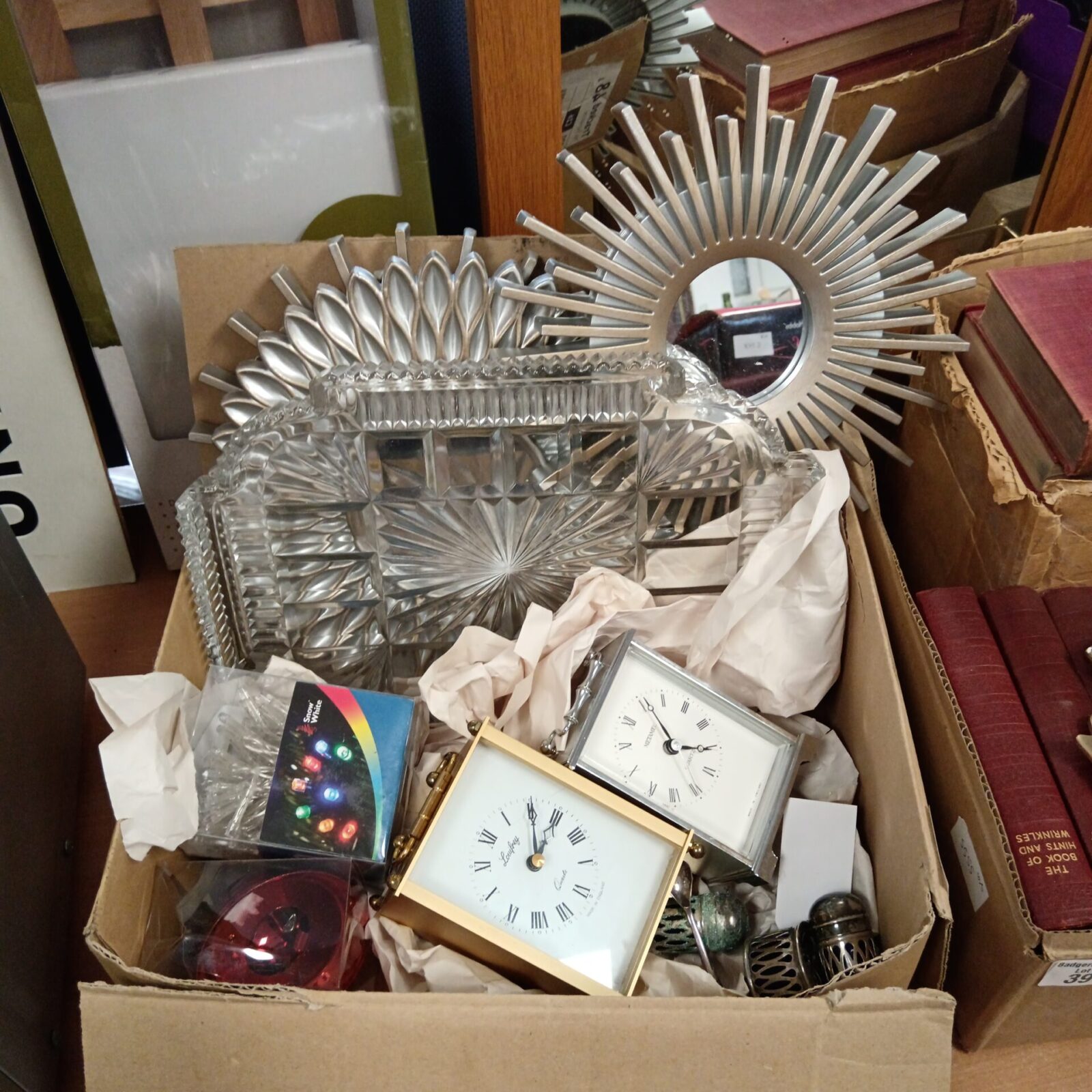 Box of carriage clocks & sunburst mirrors