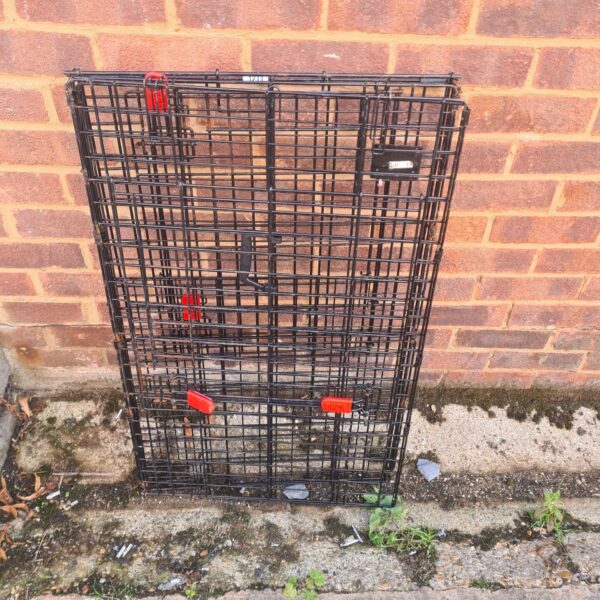 Used Kong pet cage for dog or animal transport.