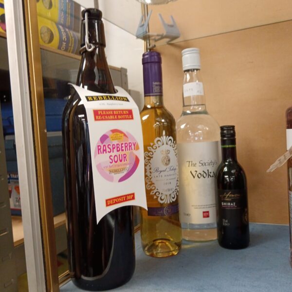 Sealed alcohol bottles lot including vodka and late harvest wine.